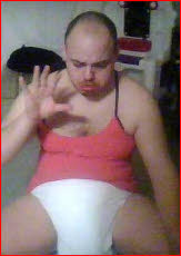 Totally tragic ABDL loser Misty exposed in a girlie pink top and diapers