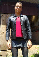 Sissy Joanne fully exposed in black leather skirt