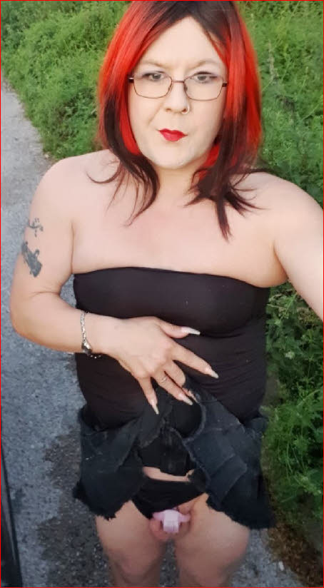 Transsexual sissy Debbie with locked cock on show