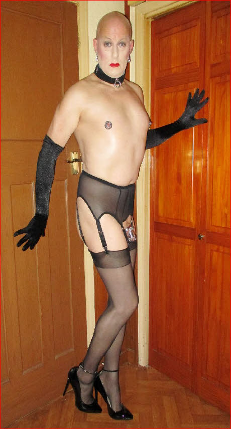Mincing fairy Richard from Birmingham in opera gloves and cock cage