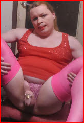 Sissy Doris exposes caged cock