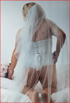Transvestite BBW escort Jenny in bridal lingerie