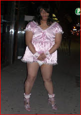Sissy Michelle flashes white panties in short pink frock