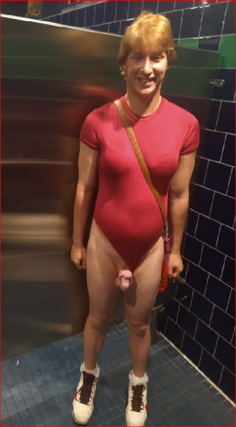 Sissy in pink leotard with locked clit poking out