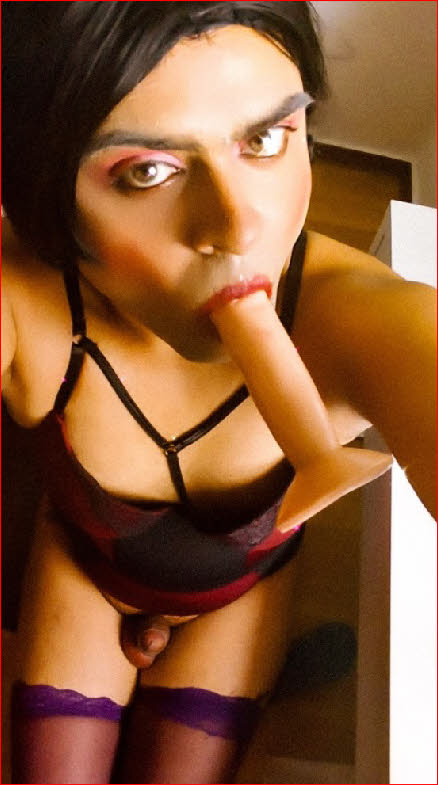 Small-dicked sissy Sandy sucks huge dildo