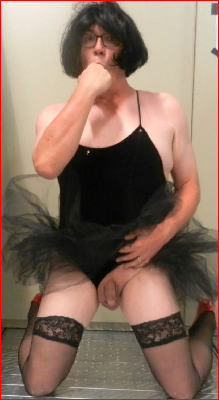 Sissy Tina raises lacy tutu to expose limp dick