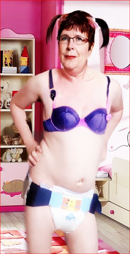 Weiird French sissy Justine exposed in girlie bra and diapers