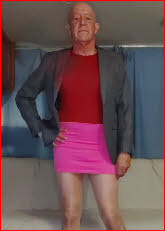 Cross-dressing faggot Andrew Brown posing like a sissy